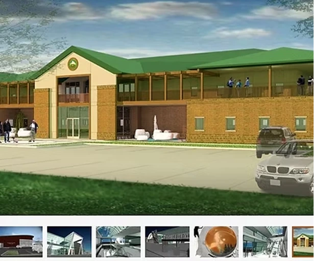 Government services building under construction with workers and equipment.