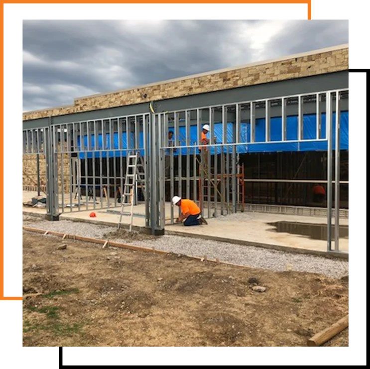General contractor overseeing construction site and coordinating project teams.
