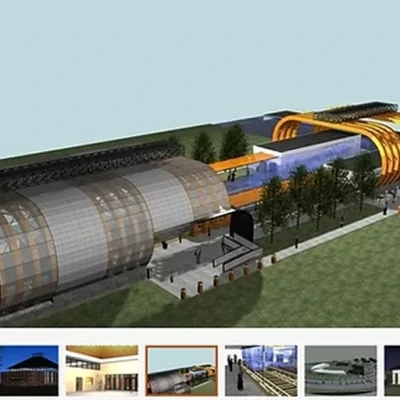 Exterior view of a train station in Italy with trains and passengers.